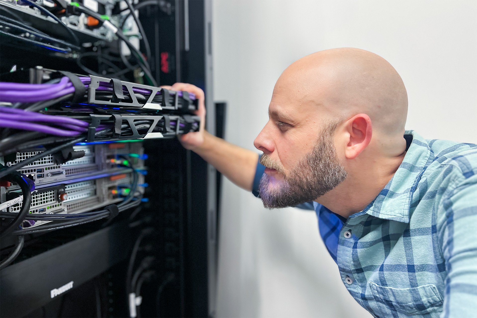 IT professional checking a server