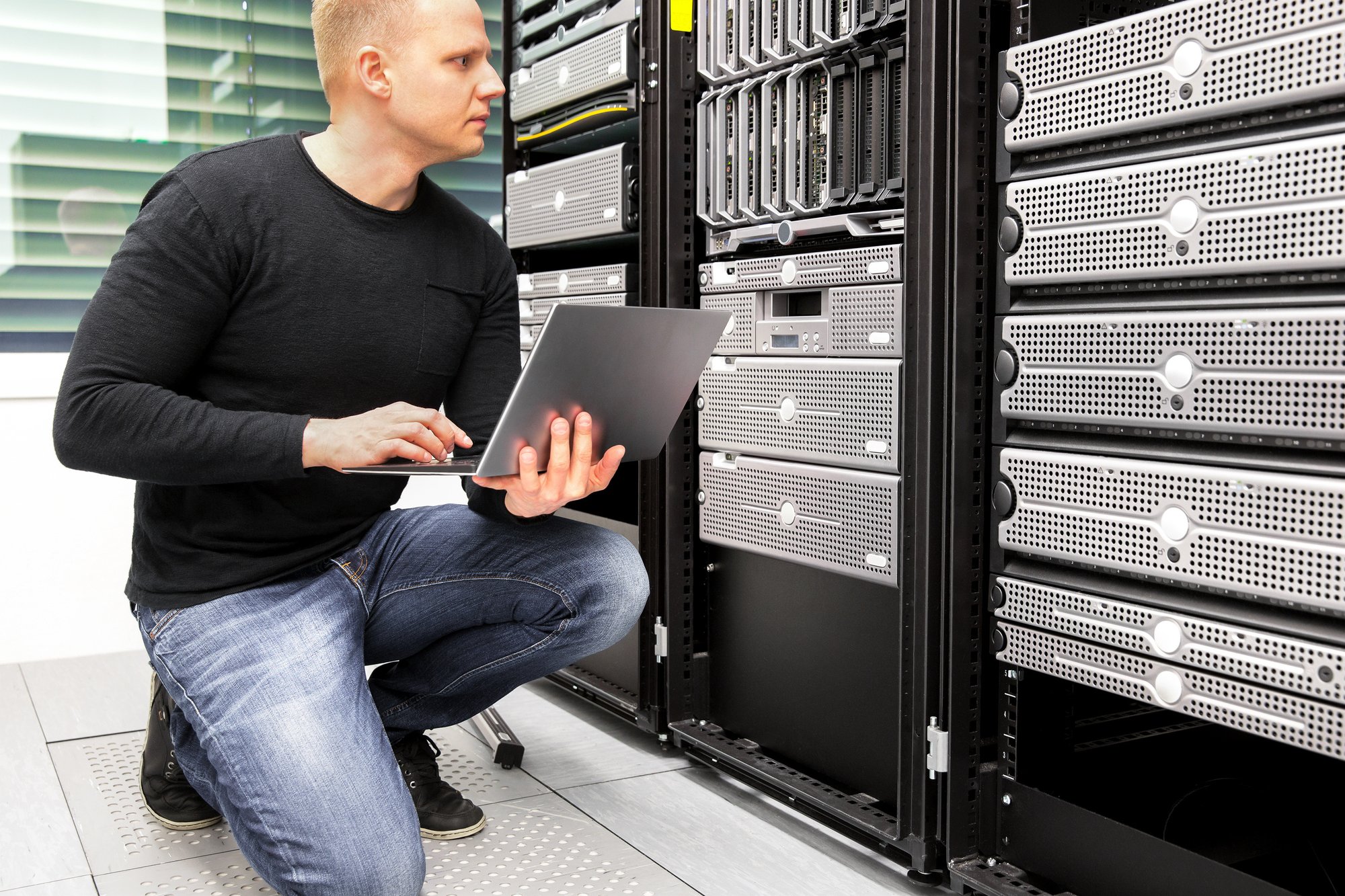 IT professional checking a server